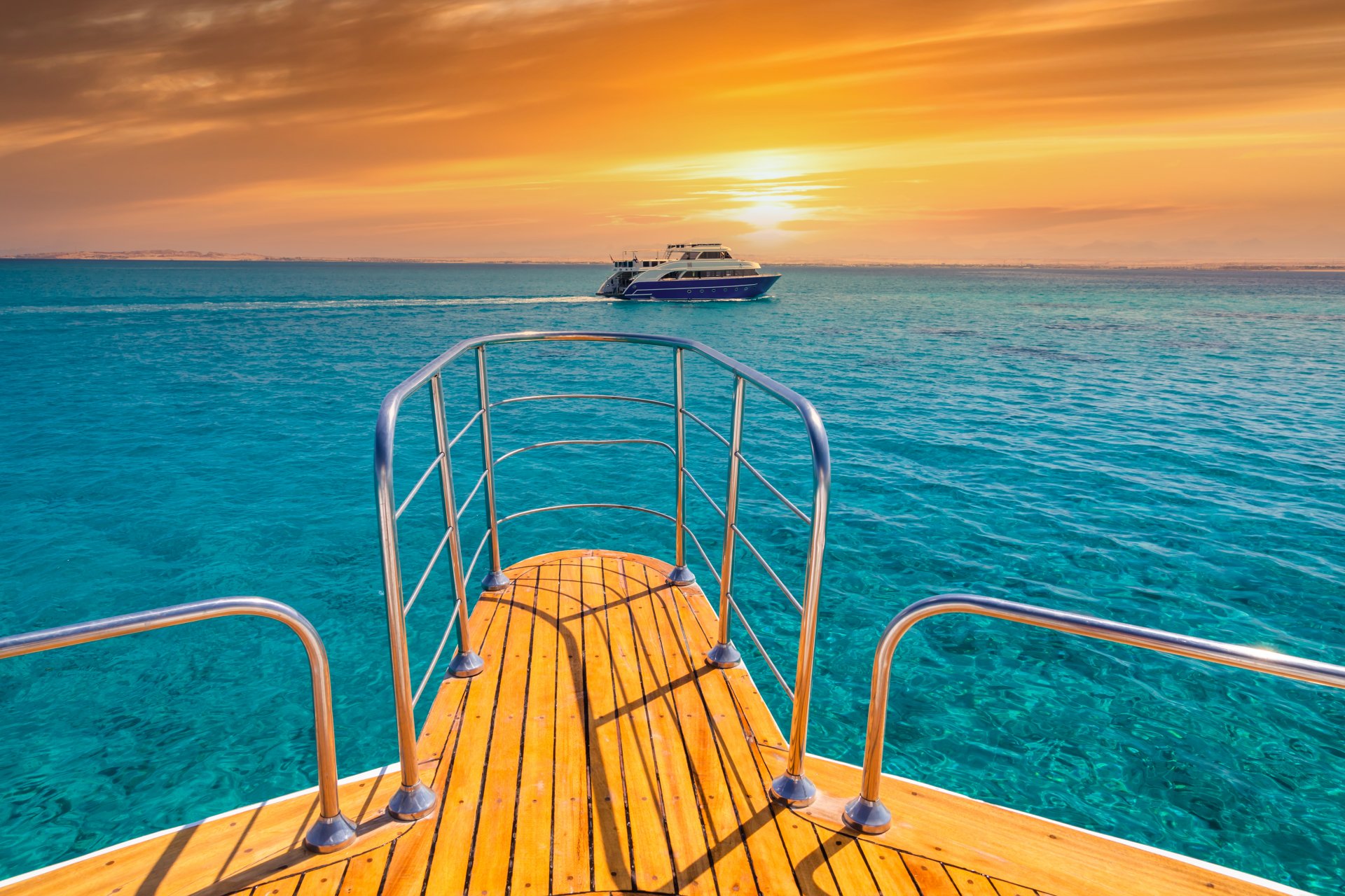 cruise-yacht-bow-in-clear-water-near-a-coral-reef-2021-08-29-07-16-58-utc (1)