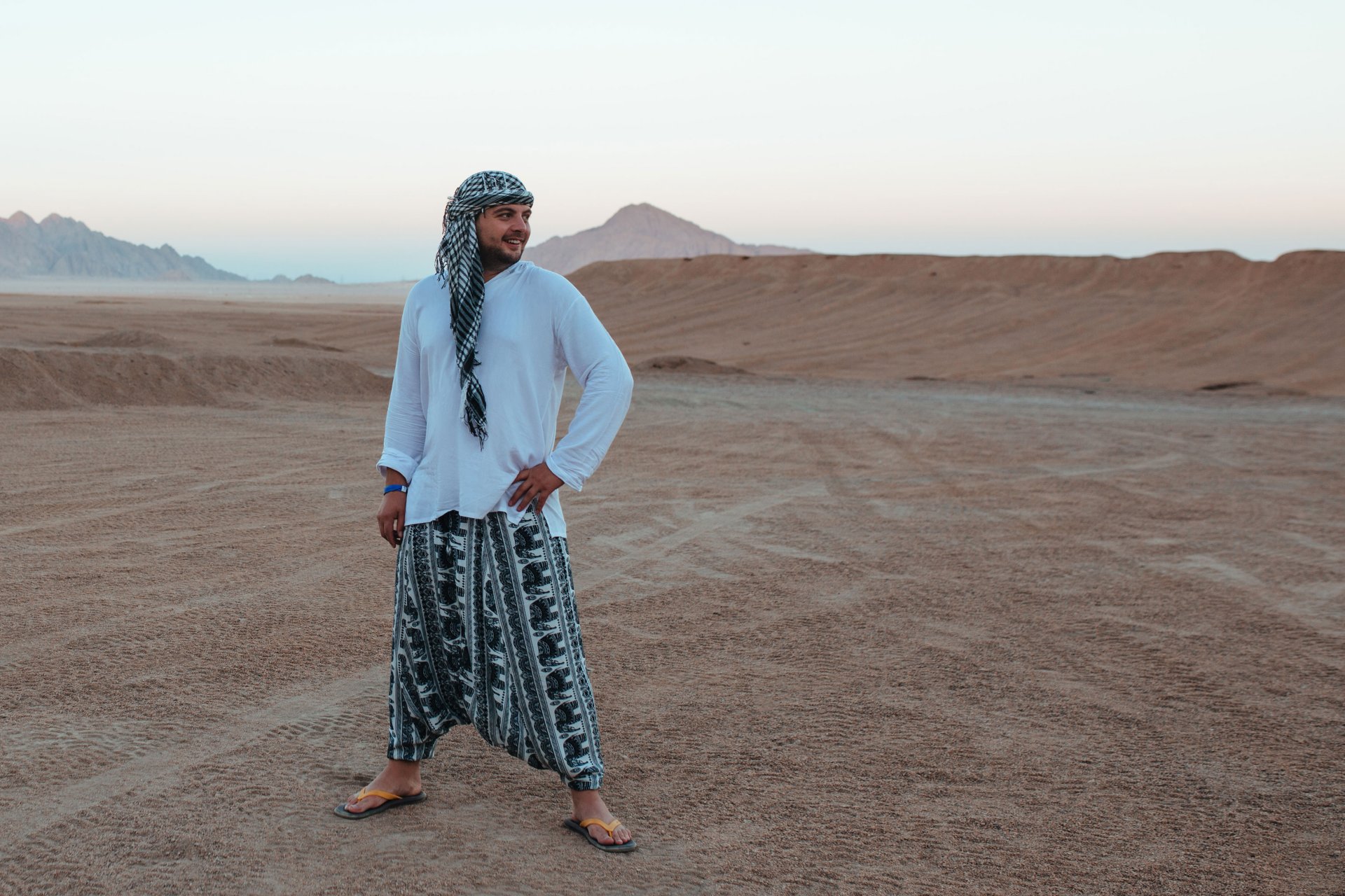 man-in-arafat-and-bedouin-clothes-in-the-desert-on-2023-11-27-05-19-56-utc