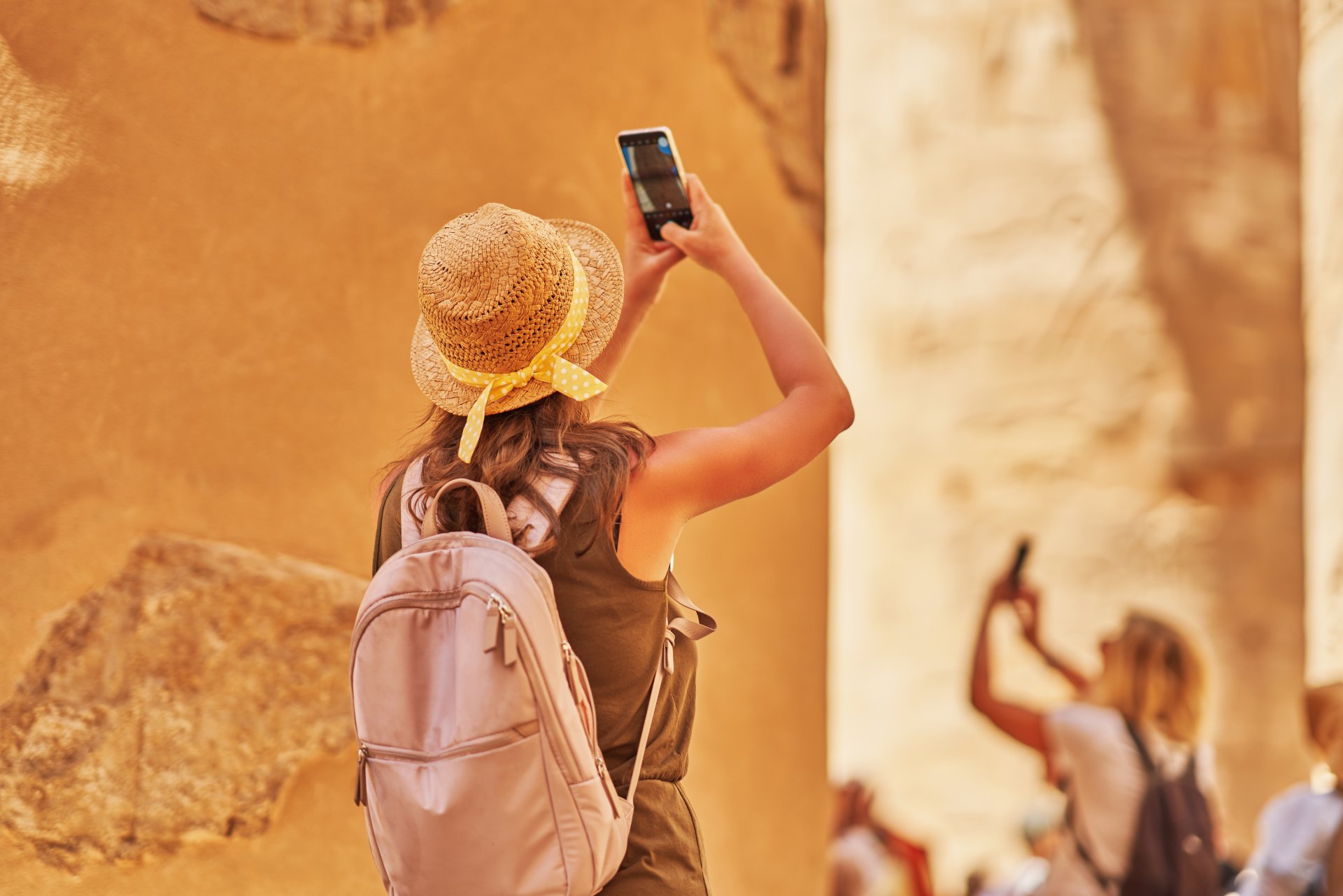 tourist-woman-in-karnak-temple-in-luxor-egypt-2023-11-27-05-31-21-utc