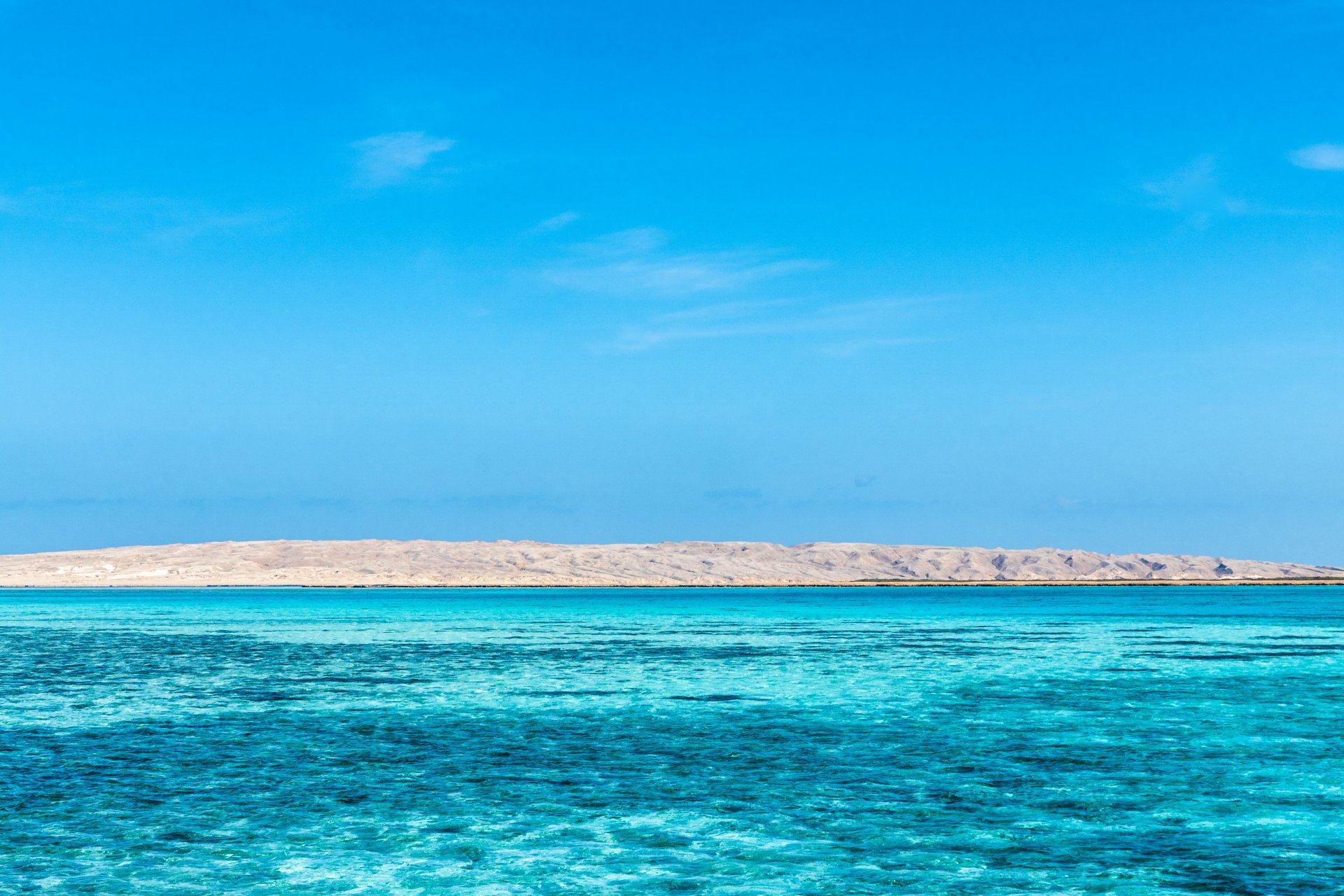 tranquil-blue-sea-and-sky-with-pristine-white-san-2023-11-27-04-53-27-utc