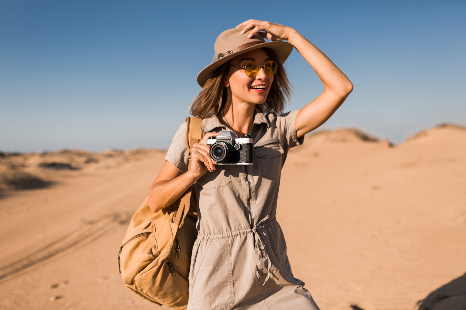 woman-in-desert-walking-on-safari-2023-11-27-05-29-44-utc